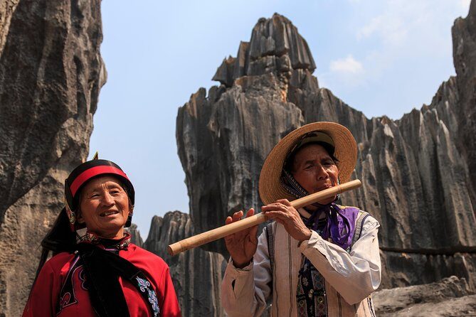1 Day Stone Forest & Jiuxiang Cave Tour - Stone Forest: limestone trees, legends, and Sani culture