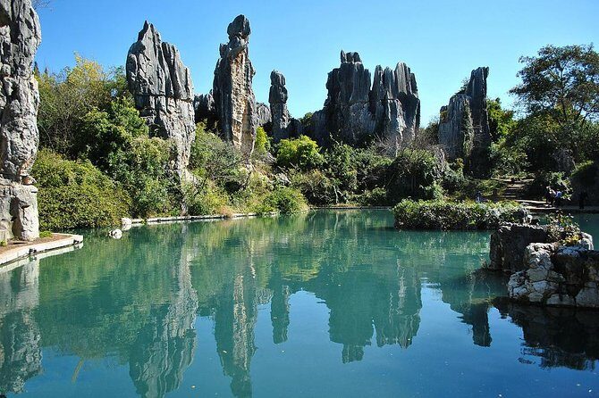 1 Day Stone Forest & Jiuxiang Cave Tour - How pickup and drive time shape your day