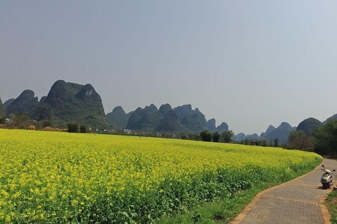 1 Day Yangshuo private Day Tour with the Scooter - Stop 1: Yulong Bridge area—start strong, then head into karst countryside