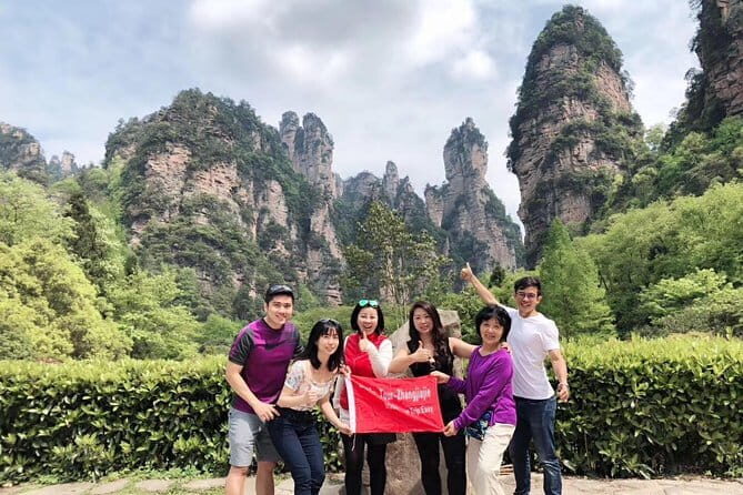 4 days In-Depth Zhangjiajie Panorama Tour - Day 3: Glass Bridge Courage, Grand Canyon Walks, and Baofeng Lake Music