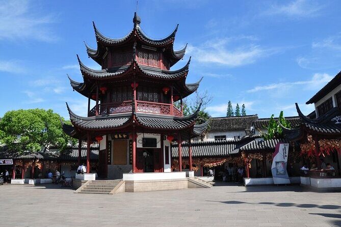 4-Hour Qibao Ancient Water Town Private Tour with Metro Experience - Qibao Old Street: lantern canals, alley lanes, and street-food choices