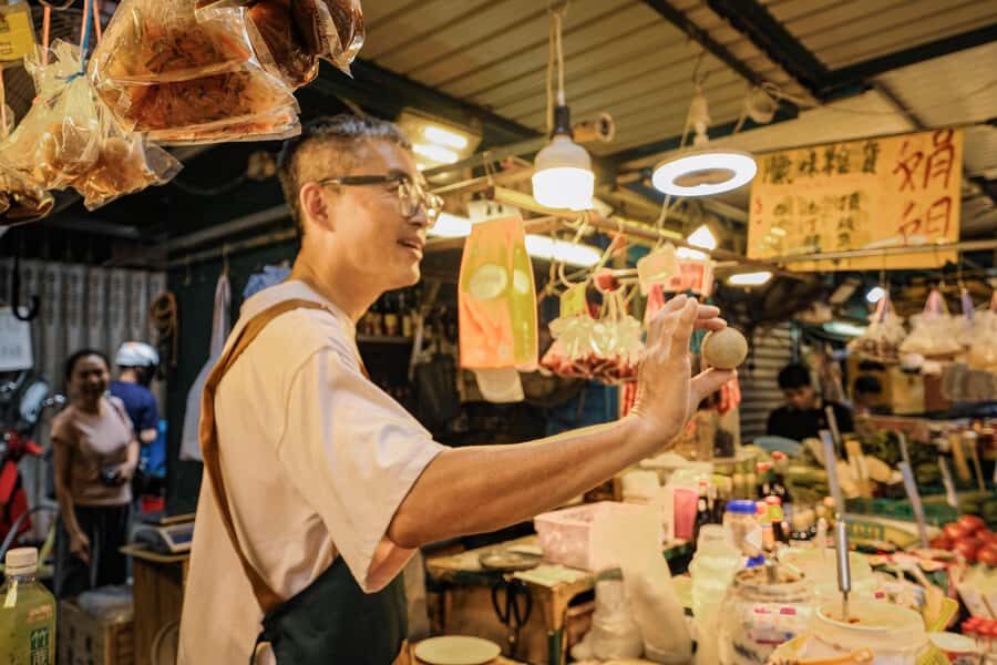 A Day in the life of a Hong Konger Tip Based Walking Tour - Century Egg, Live Chicken Checks, and Chinese Medicine Street Logic
