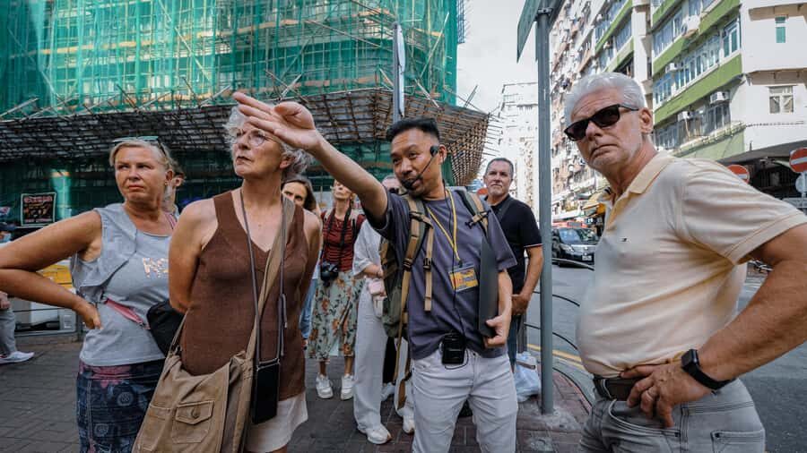 A Day in the life of a Hong Konger Tip Based Walking Tour - Ladies’ Market: Bargaining Techniques and the Lively Atmosphere