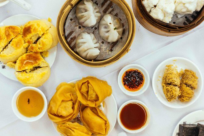 A Taste of Hong Kong: Private Tour With Locals - Stop 1 and 2: Flower Market Road and Fa Yuen Street Market