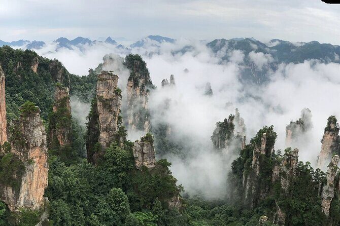 All-inclusive 4-Day Private Zhangjiajie Tour Includes Glass Bridge& Evening Show - Day 3: Glass Bridge, Grand Canyon thrills, and Yellow Dragon Cave