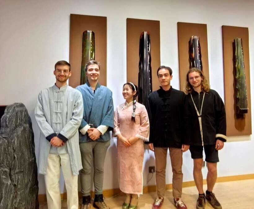 Beijing Culture Event: Tea Ceremony, Music Show, Calligraphy - The guides: bilingual teaching with history context (not just translation)
