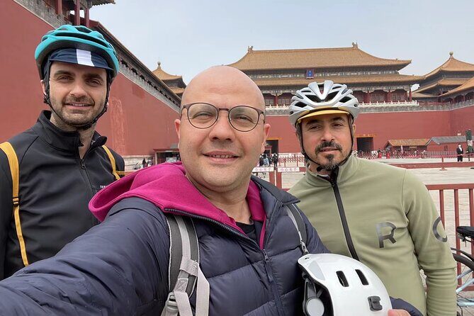 Beijing Highlights-Private Beijing Bike Tour - Tiananmen Square after dark: huge scale, calmer mood