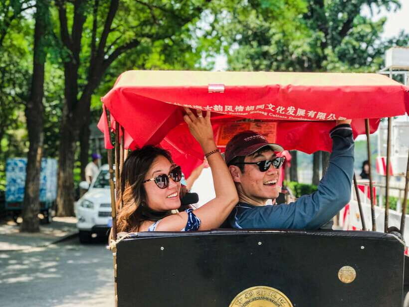 Beijing: Hutongs & Drum Tower City Walking Tour - The hooded rickshaw ride through ancient alleyways (old-city speed, not tourist speed)