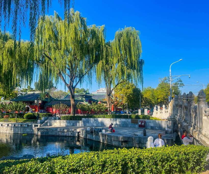 Beijing: Hutongs & Drum Tower City Walking Tour - Taoism temple by the Jing-hang canal and Wanning Bridge: religion as a lived story, not a lecture