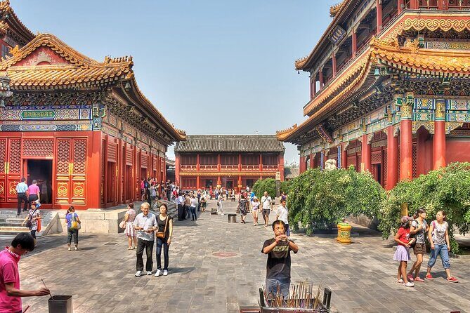 Beijing Lama Temple Entrance Ticket with Optional Guided Service - Inside the halls: incense-stick ritual, Maitreya details, and an 18m Buddha
