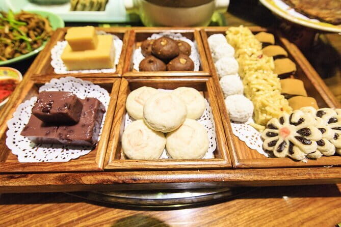 Beijing Walking Food Culture Tour in Hutong and Hidden Places - Stop 2 around Shichahai Lake: from lively edges to quiet alleys
