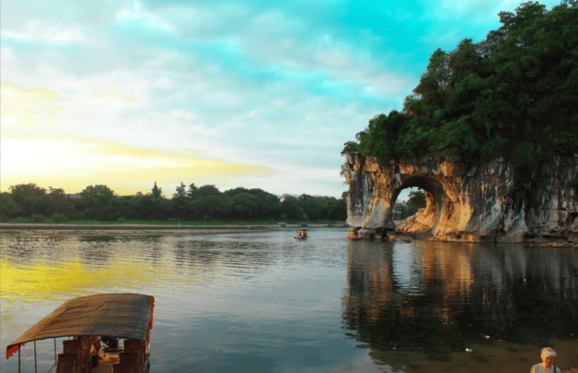 By bullet train Guangzhou to Guilin city highlights tour - Reed Flute Cave: neon-lit karst and Tang-era inscriptions