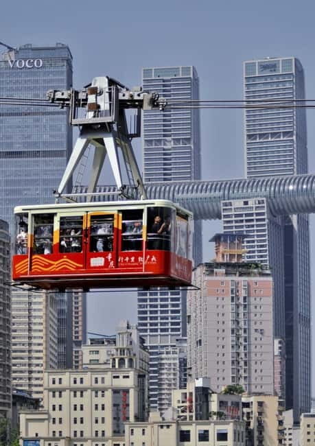 Chongqing: Surreal Urban, Ancient Town, and Secret Viewpoint - Liziba Monorail Through a Housing Block: The Screenshot That Feels Illegal