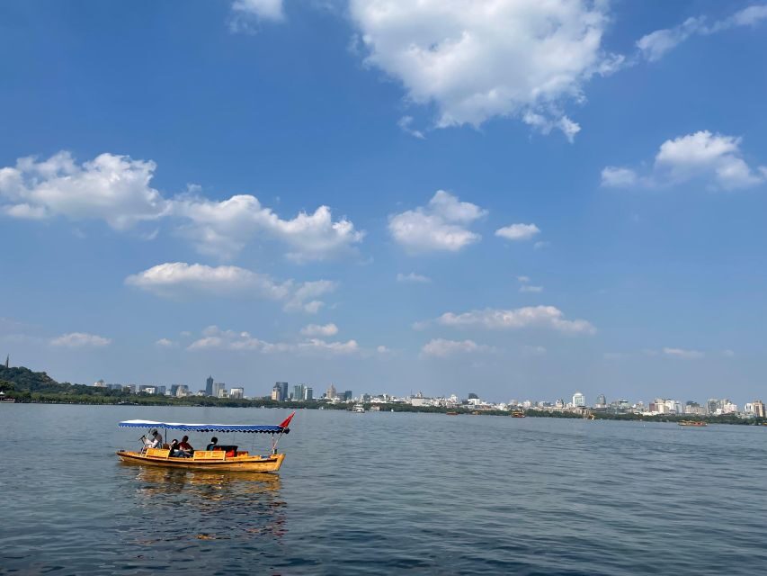 Customized Hangzhou Guided Tour Based on Your Interests - West Lake walk, boat time, and Leifeng Pagoda: the classics with context
