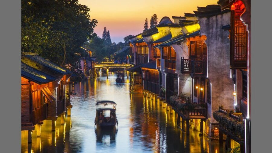 Delve into Wuzhen Water Town: Private Tour from Shanghai - Guides who set the tone: Berlin, Caroline, and Kimi in action
