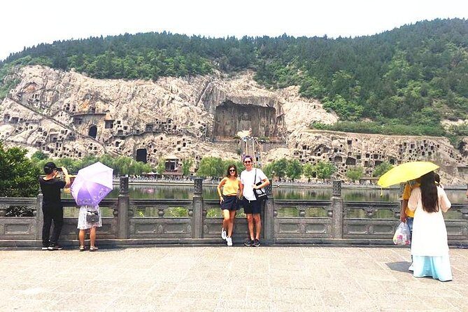 Form Xi'an To Luoyang Longmen Grottoes & Shaolin Temple Day Tour by Bullet Train - Longmen Grottoes along the river: how to look beyond the obvious
