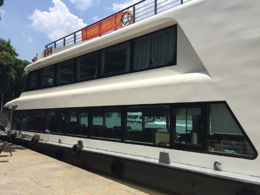 From Guilin: 4 Star Luxury Li River Cruise with Buffet Lunch - From Guilin hotel pickup to Zhujiang Pier: how the day starts
