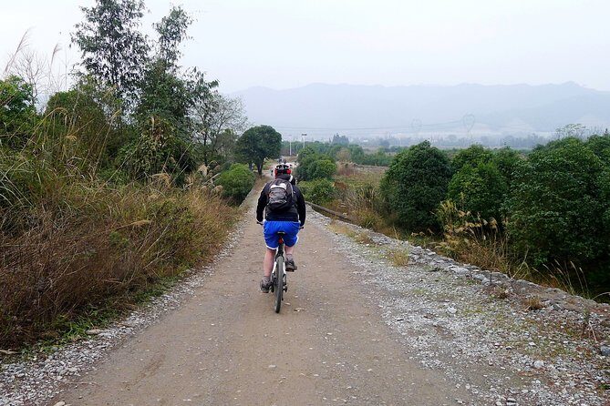 Full-Day Private Biking Activity in Yangshuo - Private Biking With an English-Speaking Guide: Route and Language Help