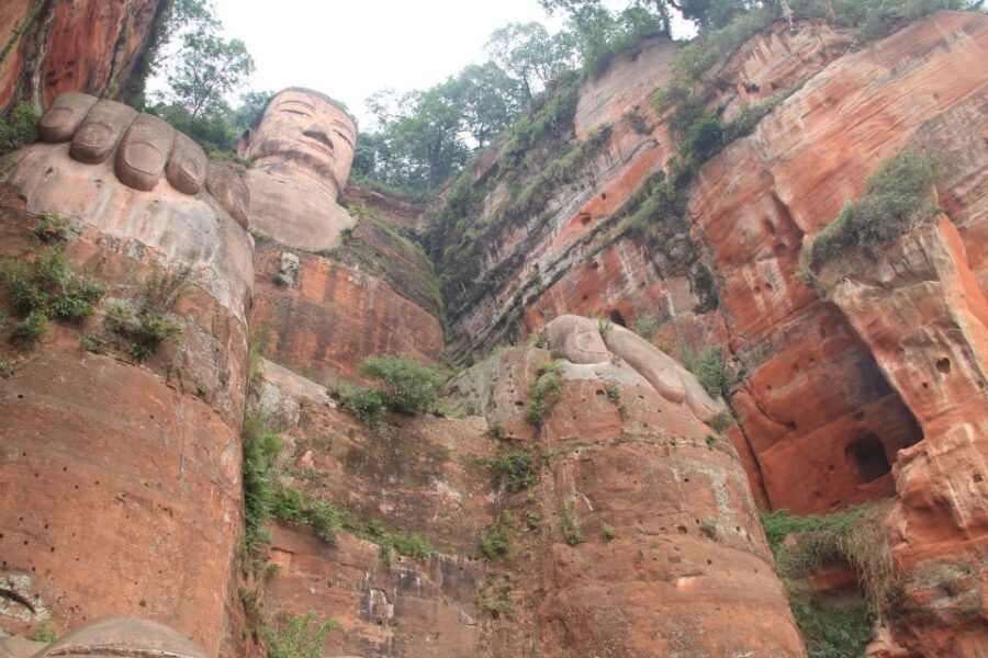 Full-Day Tour of Leshan's Giant Buddha from Chengdu - Entering the Leshan Grand Buddha Scenic Area: feet, river, and big views