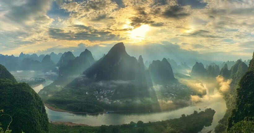Guilin: 1-Day Cave, Xianggong Hill, Bamboo Boat & Show - Reed Flute Cave: the “glow-up” limestone you’ll actually walk through