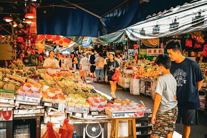 Hong Kong: Kowloon Street Market & Food Culture Walking Tour - The Hong Kong Jockey Club Off-Course Branches: Tradition Meets Law
