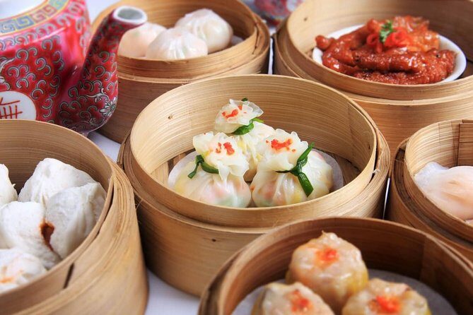 Hong Kong Private & Personalized Food Tour with a Local - Stop 4: Waterfront Walk and the Symphony of Lights Moment