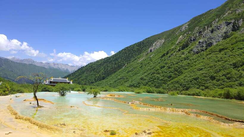 Huanglong Scenic Area: Explore Stunning Five-Colored Ponds - Time, Pace, and Facilities Along the Route