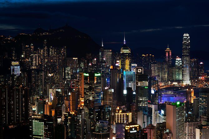 Kowloon Night Street Food Tour with a Local: Private & Customized - Stops you can expect: snacks, Mong Kok shopping, and the harbour light show