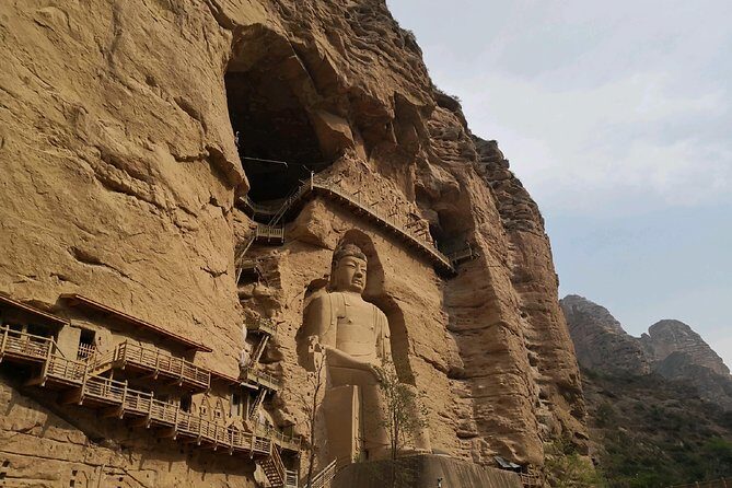 Lanzhou Private Day Tour: Binglingsi Grottoes and Liujiaxia Gorge - Inside Binglingsi Temple Grottoes: statues and murals you can actually read