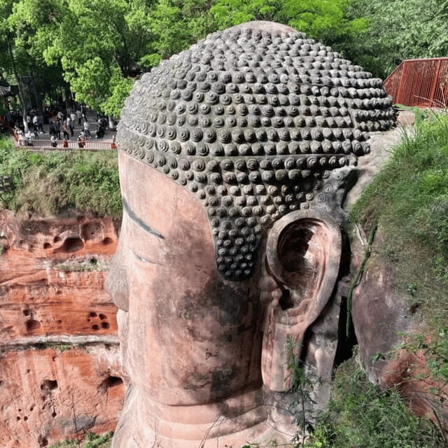 Leshan Giant Buddha Tour: Discover Ancient Stone Masterpiece - Lunch and Food Tasting: Qiaojiao Beef and a Real Break
