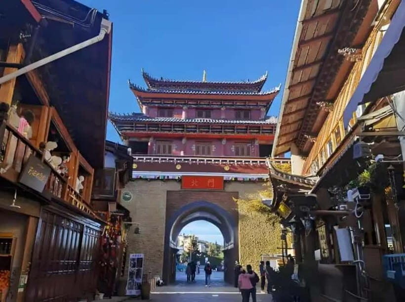 Lijiang to Shangri-La HuXiang Road Private Scenic Tour - Niru Village and Dukezong Ancient Town: Craft, Costumes, and Prayer Flags