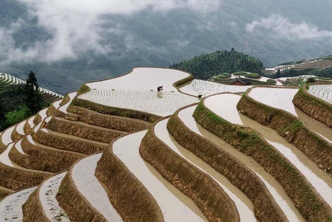 Longji Rice Terraces and Minority Village Day Tour - Yao Village stop: red costumes, long hair dance, optional extra
