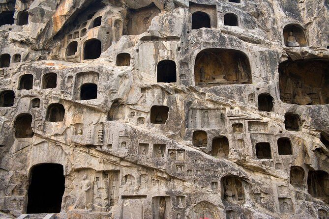 Luoyang Longmen & Shaolin Private Day Tour from Xian by HSR Train - Longmen Grottoes: UNESCO Stone Carvings and the Reality of Big Sites