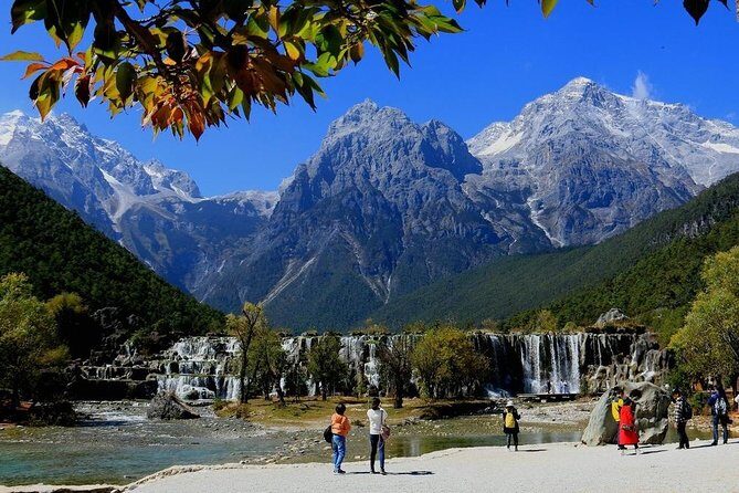 One day Jade Dragon Snow Mountain Tour with Impression Lijiang show - Ganhaizi Meadow around 3100m: buses, Baishuihe River, and Spruce Meadow by cable car