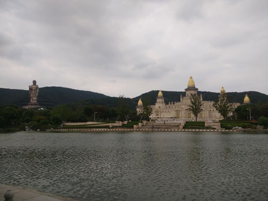 Private Day Tour to Wuxi Lingshan Grand Buddha and Tai Lake - Brahma Palace shows: Nine Dragons Bathing Sakyamuni and Ode to Auspice