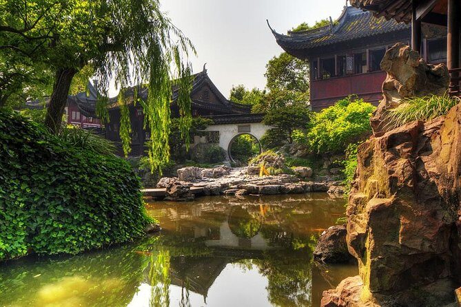 Private Full Day Tour: Zhujiajiao Ancient Water Town with Best of Shanghai - Qing Dynasty Post Office and Yuanjin Buddhist Temple: the calmer stops