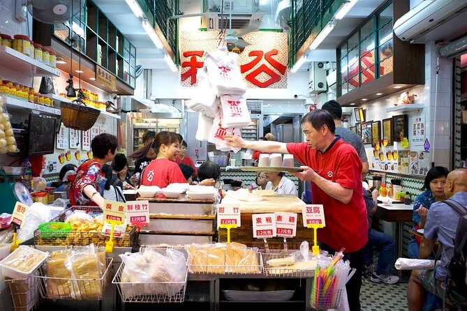 Private Kowloon Michelin Rated Street Food & Culture Tour - Starting in Sham Shui Po: the working-district kickoff