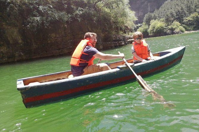 Private Longqing Gorge & Guyaju Cave Day Tour w/ Cruise Ride - Guyaju Caves: Cliffside Rooms Carved Into Daily Life