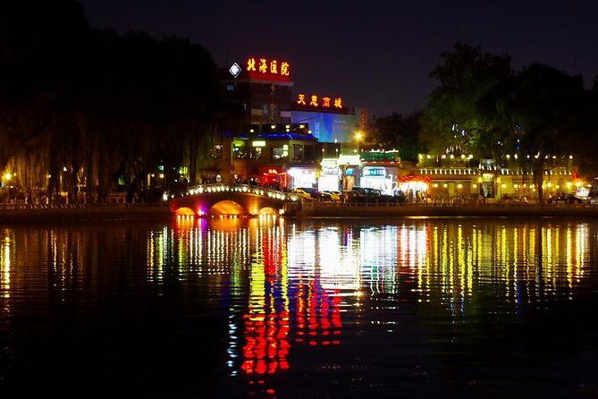 Private Night Tour: Discover Beijing in Bustling Lights - Olympic Park lights: Bird’s Nest and Water Cube glow fast