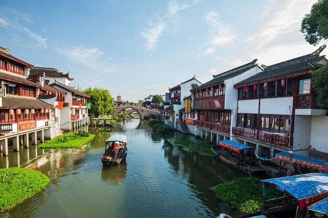 Private Qibao Ancient Town Walking Tour with Tea Tasting and Calligraphy Experience - The 90-Minute Stroll Through Qibao’s Old Alleys and Riverside Architecture