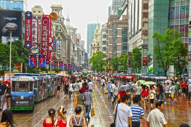 Private Shanghai Ultimate Flexible Shopping Tour: 4 or 8-hour Options - Metro City Plaza in Xujiahui: big electronics energy in a glass-ball building