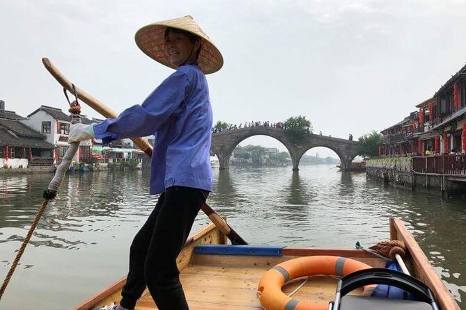 Private Tour of Shanghai Highlights and Zhujiajiao Water Town in One Day - Former French Concession drive: history you can feel through streets and structure