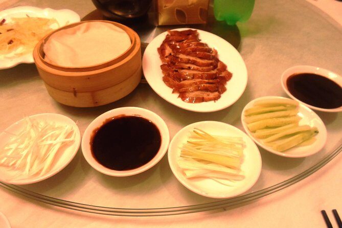 Private Tour to Pearl Market Acrobatic Show & Peking Duck Dinner - A 4pm start that keeps the night from getting messy