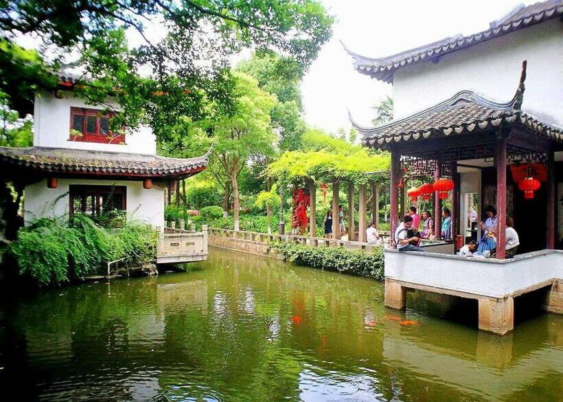 Private Tour:Zhujiajiao Water Town by German-Speaking Guide - Stone-paved water markets: crafts, snacks, and what to buy (or skip)