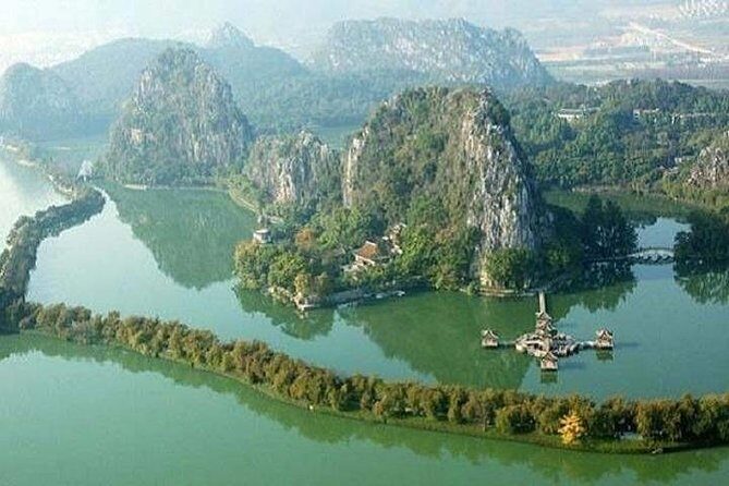 Seven Star Crag and Dinghu Mountain private day tour from Guangzhou - Dinghu Mountain Resort: forest, waterfalls, temple areas, and the on-site ride