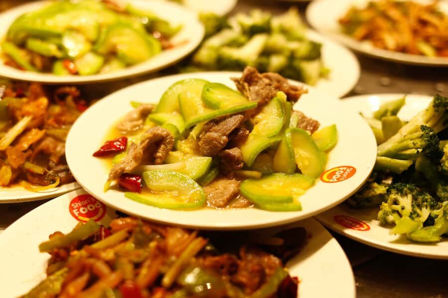 Shanghai: 3-Hour Local Food Tasting Tour - Yunnan Road walk: the city changes as you walk