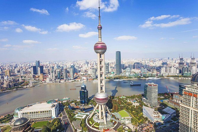 Shanghai Afternoon Sightseeing Tour including Huangpu River Cruise & OTV Tower - Oriental Pearl Tower views over Pudong and the Huangpu
