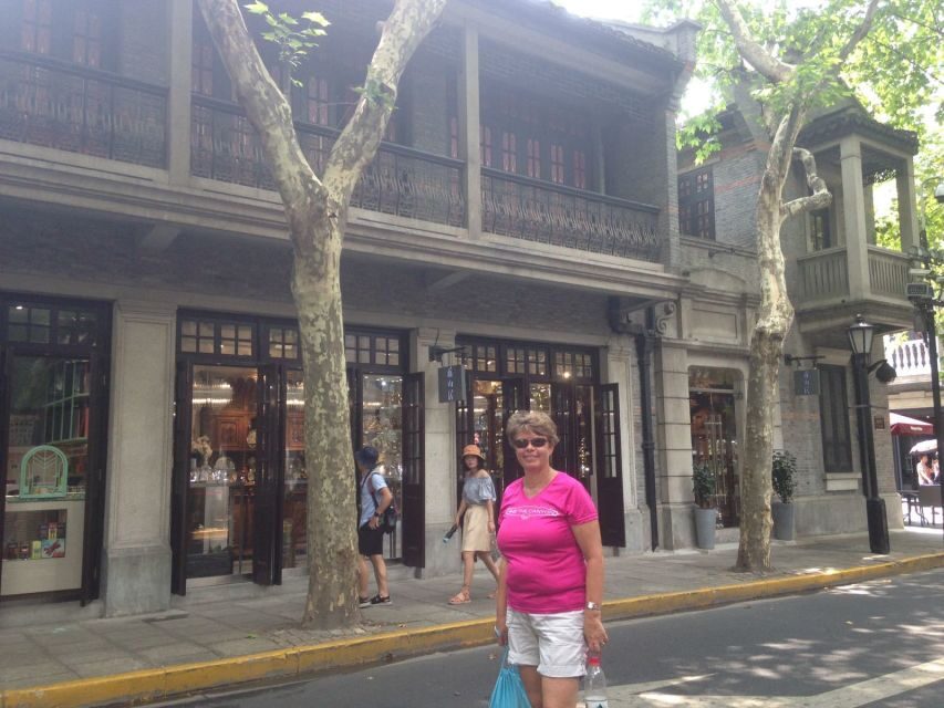 Shanghai: Guided Bicycle Tour - Street food stalls and antique stores: local stops, not a food tour