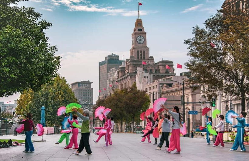 Shanghai Highlights Walking Tour With A Real Local-Tip Based - Nanjing Road to Peace Hotel and the Customs House Big Ben look: where style meets history