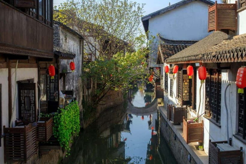 Shanghai: Private Day Tour to Suzhou by Bullet Train - Grand Canal gondola cruise: stone bridges, slow water, and real perspective